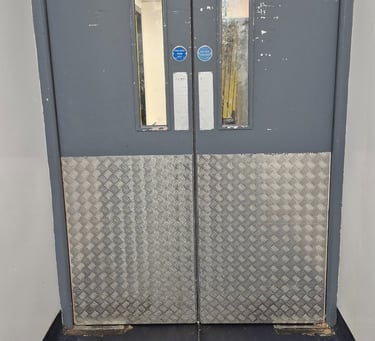 Double swing double door repair