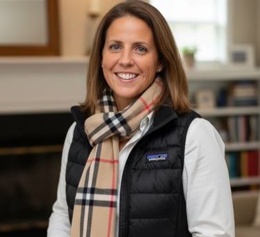 Amy McArdle, PhD, Hudson Valley real estate advisor reviewing property details.