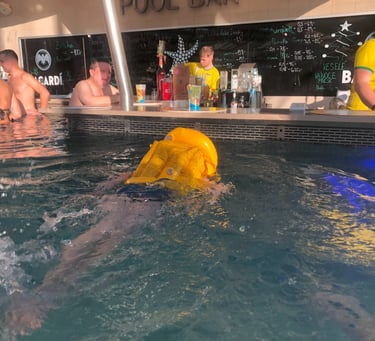 Child swimming to the swim to bar in the Aquapalace water park Prague Czech Republic