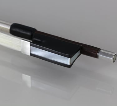 Fresh rehair for W.E. Hill & Sons violin bow