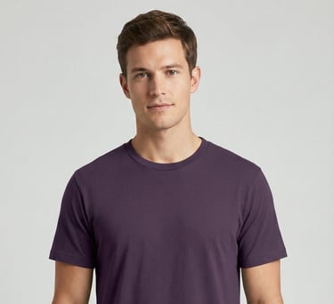 a man in a purple shirt and black pants