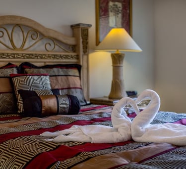 swan towels on bed in Florida Villa