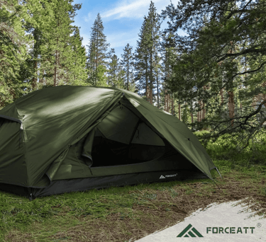 a tent with a tent pitched up in the woods