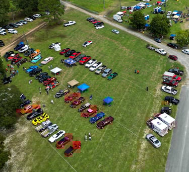 a large field with many cars parked in it