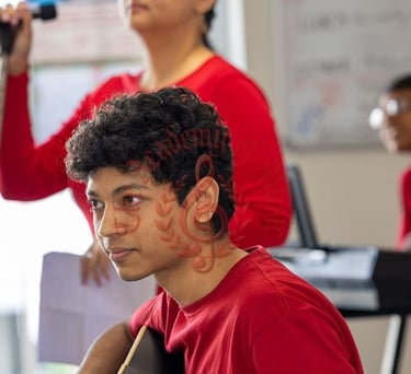 Students interacting with the elderly via music.