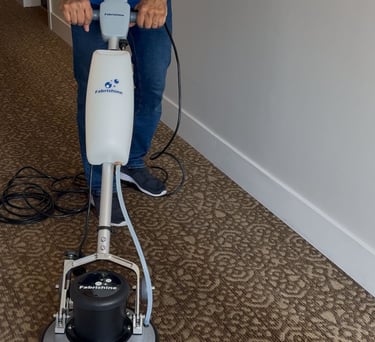 Carpet shampooing stain removal