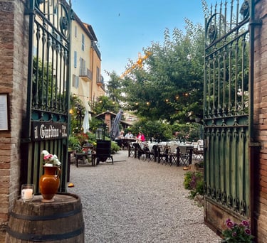 Il giardino San Gemini a gated in area with a barrel of wine