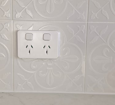 a white power point on a white splash back