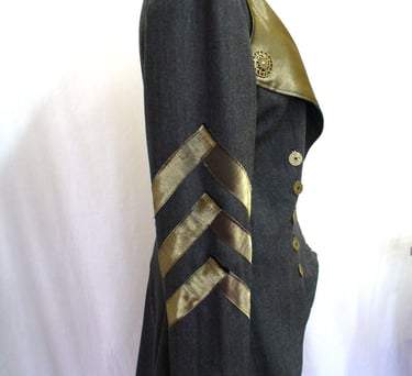 Accents of chevrons on coat sleeve