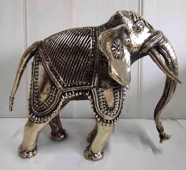 "Handcrafted brass elephant with artistic tribal design, right view-for overseas markets"