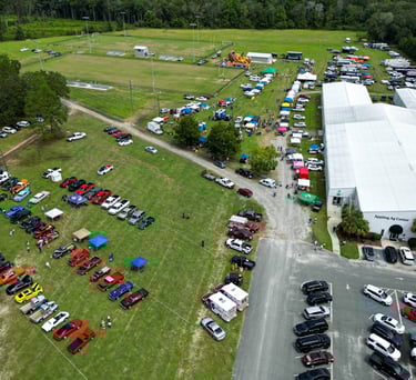 a large field with many cars parked in it