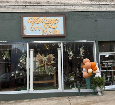 a storefront of a storefront door with balloons