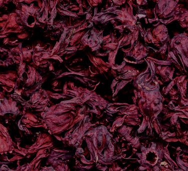 a bunch of dried red flowers that are dried