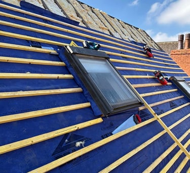 a roof top with a skylight and a skylight