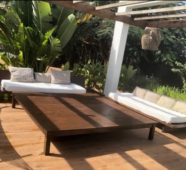 a couch and a table in a patio