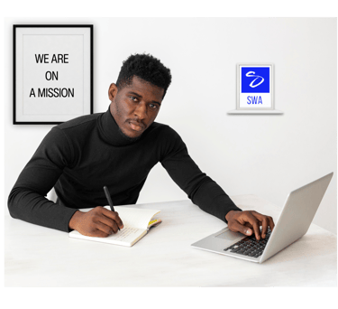 Writer in Office working to fulfil SWA mission 