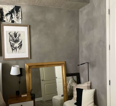 a couch with pillows and pillows in a room