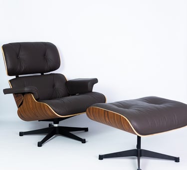 Black leather Eames lounge chair with ottoman – iconic designer chair