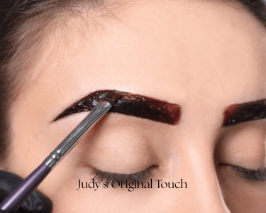 a woman with a black eyeliners and a black eyeliner