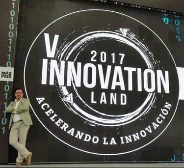 a man standing in front of a large screen with a large screen