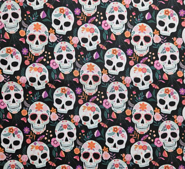 Sugar skull pattern fabric featuring Day of the Dead calaveras with colorful floral decorations on black.