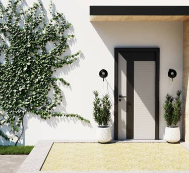 Trabajo de pintura en la fachada de un chalet en Berango