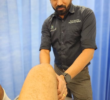 Professional physiotherapist assisting patient with mobility therapy