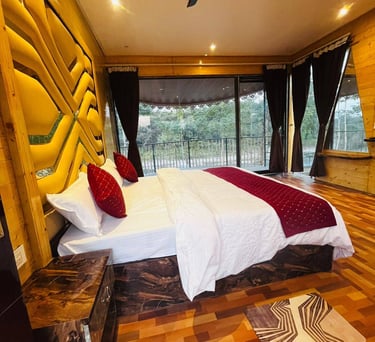 a patio with wicker chairs and a table