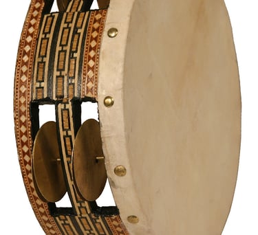 Middle eastern Riq hand drum with cymbals
