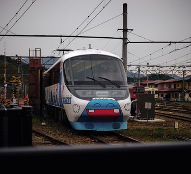 a train car is parked on the tracks