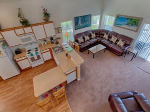 a living room with a couch in open plan Florida Villa