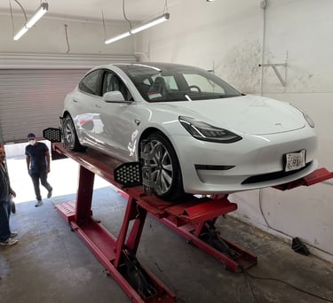 wheel alignment for electric cars, Tesla