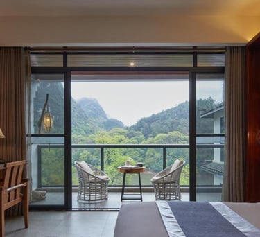 Yangshuo's Li River and mountains right from your Riverview Double room