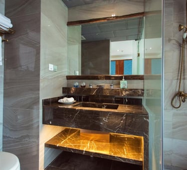 Freshen up in your private bathroom at the Yangshuo Li River Resort
