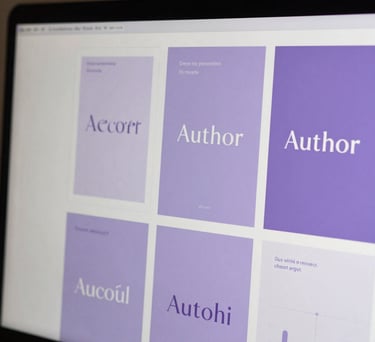 Close-up of a digital design mood board on a screen, featuring sophisticated typography and lavender color palettes for an author's personal brand.