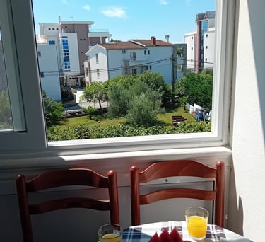 a kitchen with a refrigerator and a refrigerator freezer