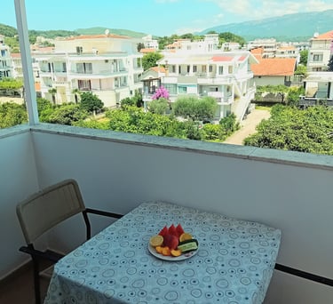 a plate of fruit on a table with a plate of fruit