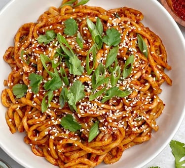 a bowl of noodles with Chili Oil
