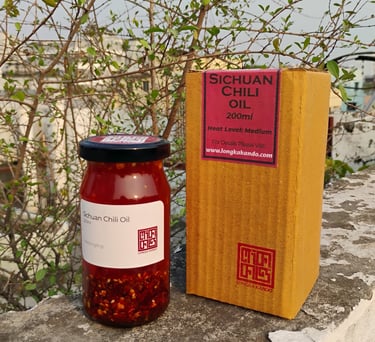 a jar of Longka Kando Sichuan chili oil on a ledge