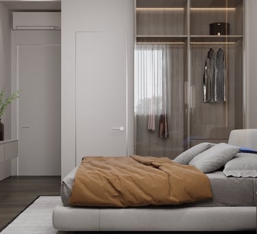 a bedroom with a bed and a television