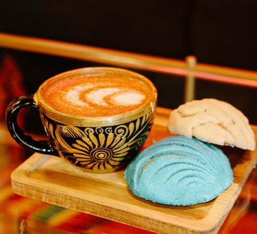 a perfect churro latte hot with cafe con chisme signature conchas