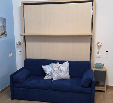 Letto a scomparsa con divano