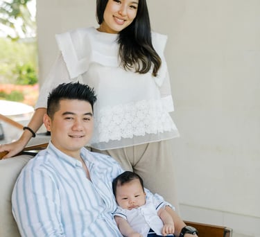 Family relaxing together inside their suite at Samabe Bali Suites & Villas in Nusa Dua.