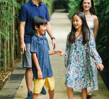 candid family walking moment captured at Westin Nusa Dua Bali during relaxed session
