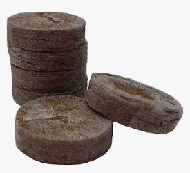 a stack of compost pellets