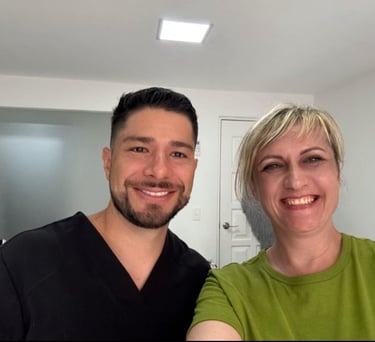 a man and woman standing in dental office Cancun Olya Freiman