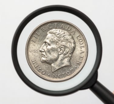 A photograph of a magnifying glass enlarging the date on a rare silver coin. Bright, clean, professional lighting. North American / US context.
