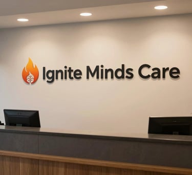 A neat, professional reception area of Ignite Minds Care, featuring a logo with a flame and brain symbol, with warm lighting and a South Asian aesthetic.