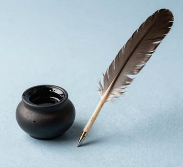 A minimalist composition of a traditional Indian ink pot and a feather quill resting on a light blue fabric, representing intellectual depth and creative passion.