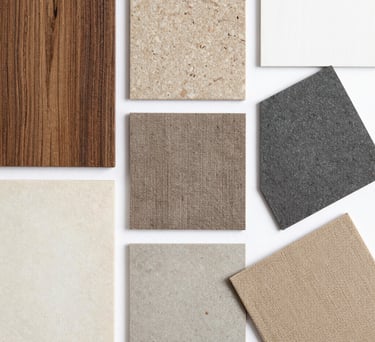 A panoramic view of a luxurious interior featuring floor-to-ceiling windows and layered natural materials.